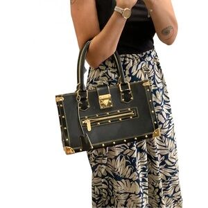 Louis Vuitton
Le Fabuleux leather handbag